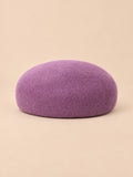 Elegante Baskenmütze aus Wollfilz für festliche Anlässe – Farbvariante Violett, runde Form, Ansicht von vorn