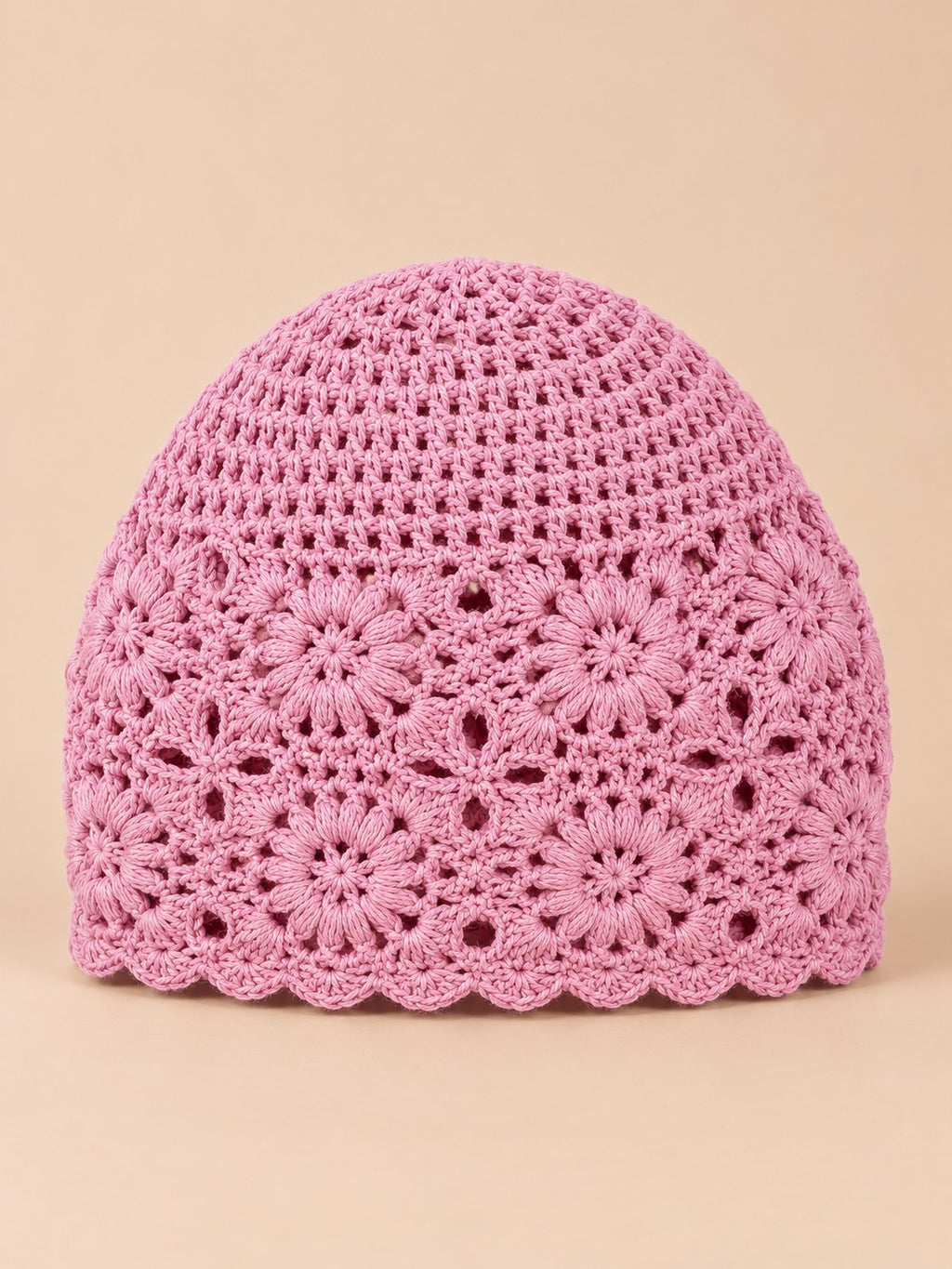 Rosa Baskenmütze für Damen mit gestricktem Blumenmuster und leichter, luftiger Struktur, Vorderansicht