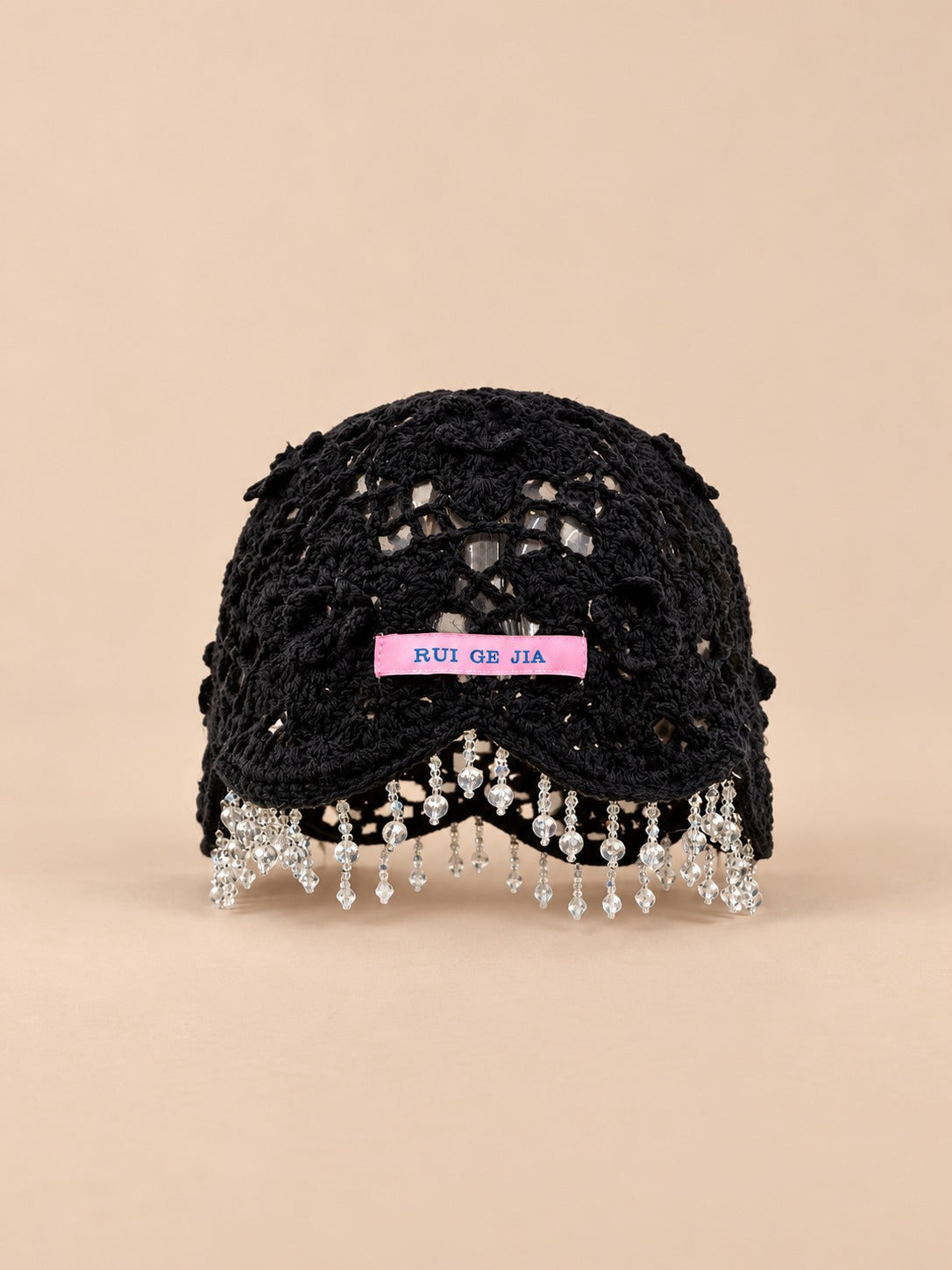 Bonnet bohème au crochet à perles et pompons, noir, vue de face
