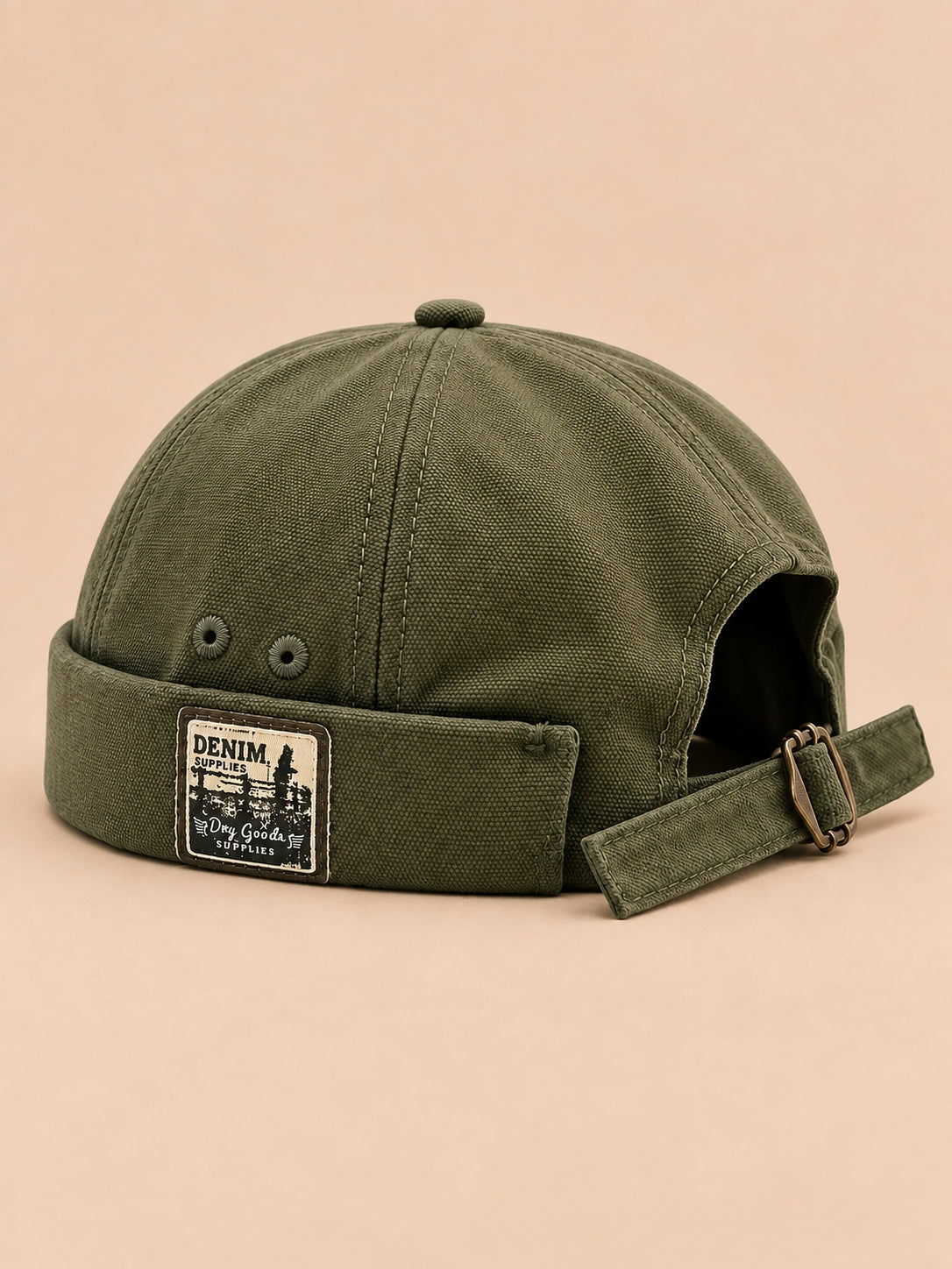 Bonnet docker réversible vert, vue de trois quarts.