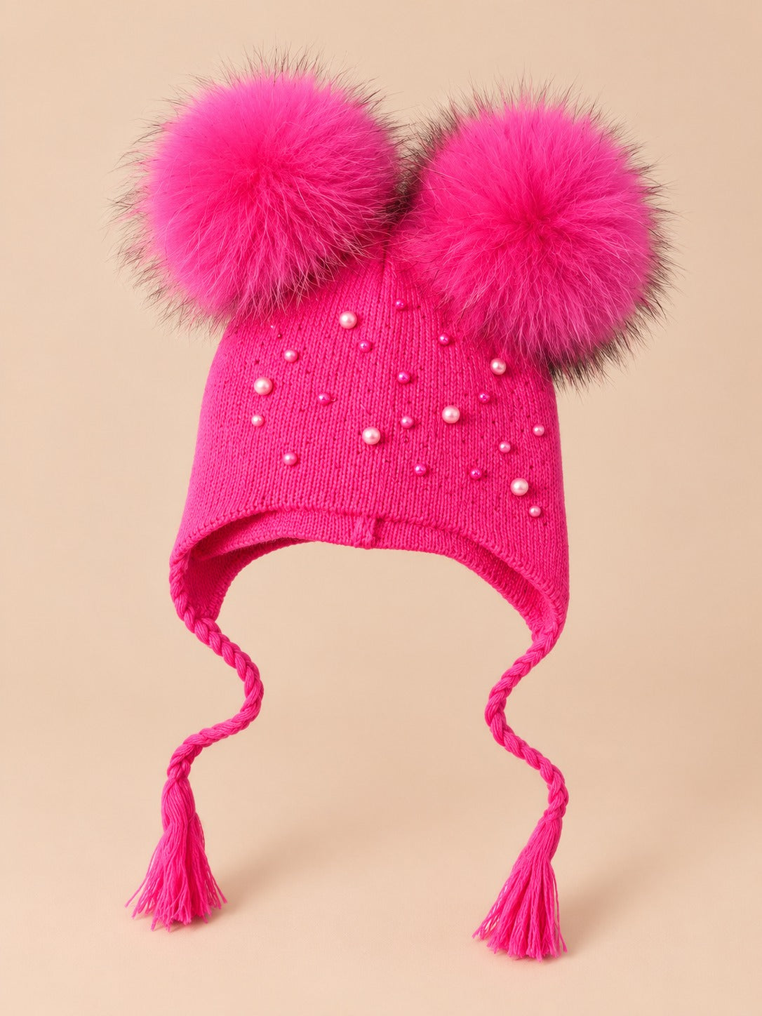 Bonnet enfant à deux pompons en fourrure, framboise pompons assortis vue de face