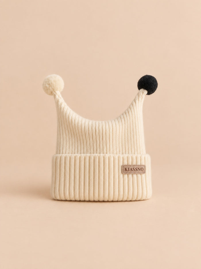 Petits pompons aux extrémités