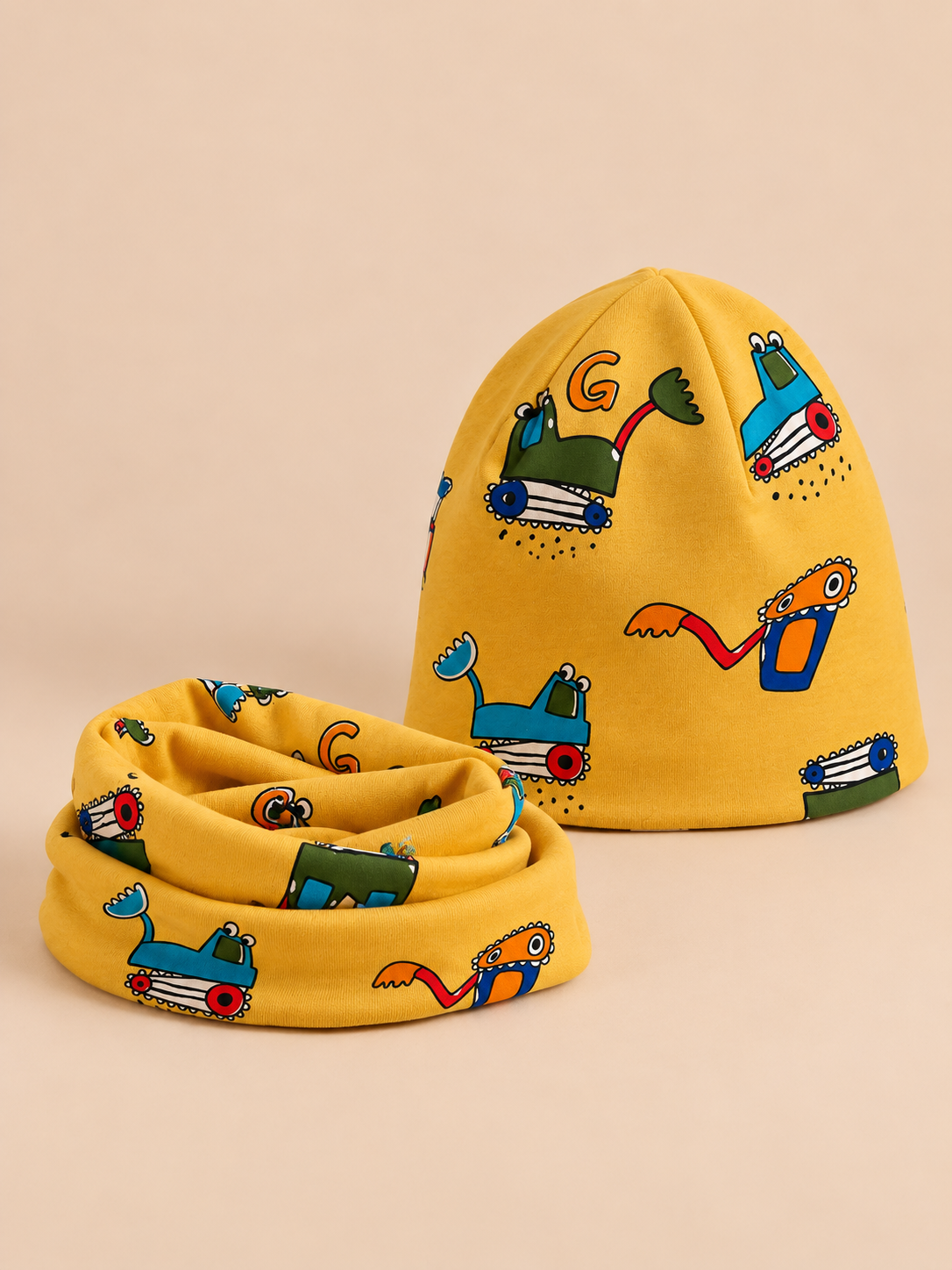 Ensemble bonnet et snood enfant Camion jaune, vue de trois quarts.