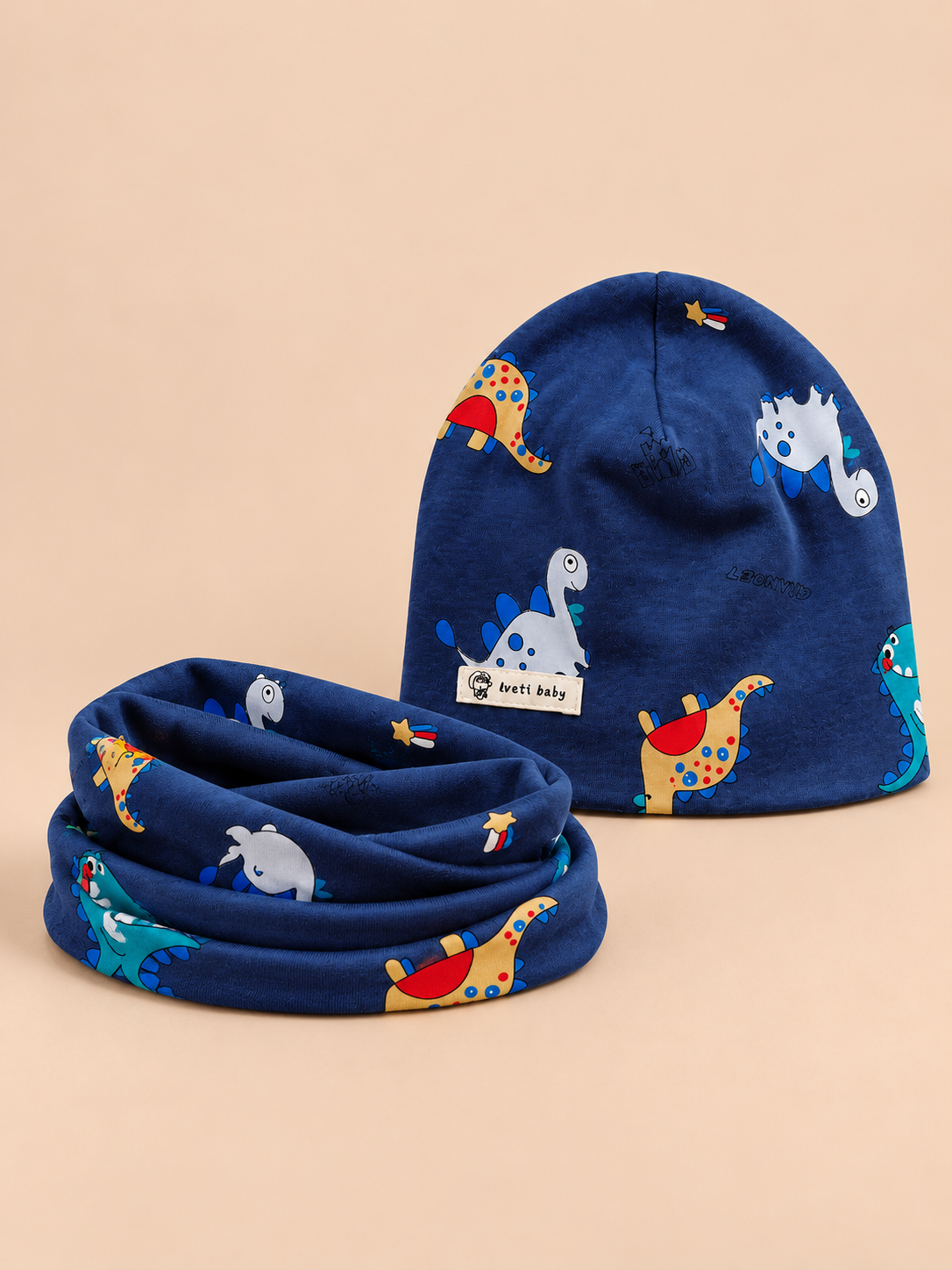 Ensemble bonnet et snood enfant Dinosaure bleu marine, vue de face.