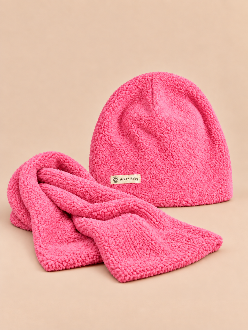 Mütze aus dem Mütze-Schal-Set für Kinder – Farbvariante Fuchsia, Ansicht von vorn