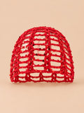 Gestrickte Netzmütze in luftiger Tuchform – Farbvariante Grün, Produktdarstellung in der Vorderansicht
