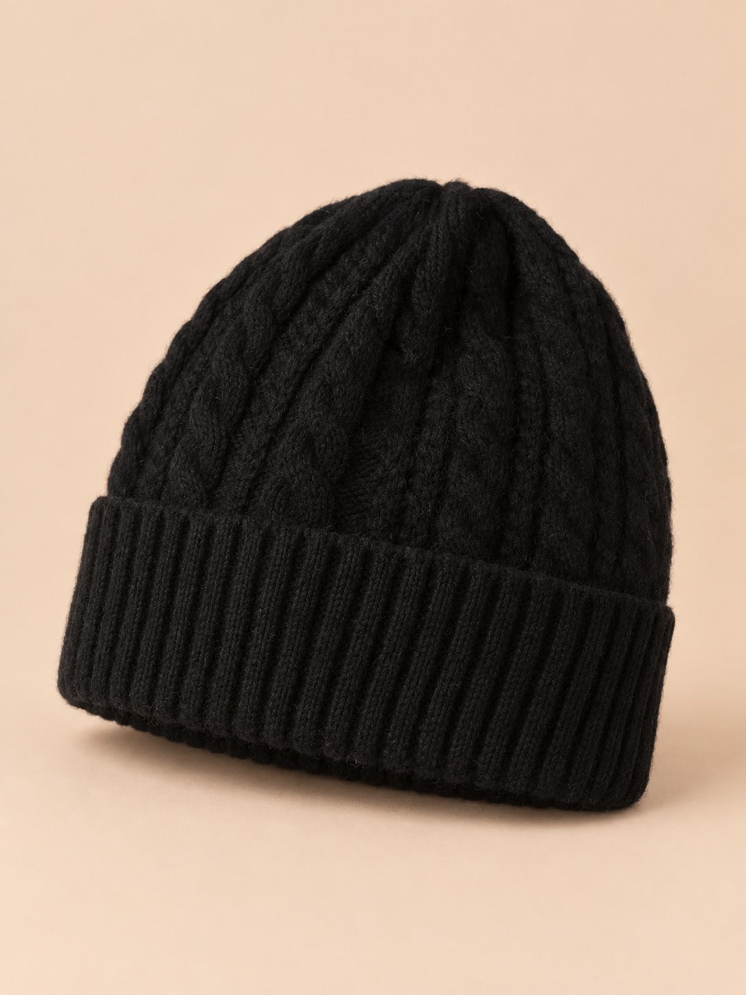 Bonnet torsadé femme en pure laine, noir, vue de trois quarts