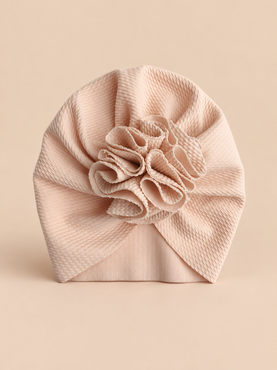 Baby-Turbanmütze mit Blume für neugeborene Mädchen – Farbvariante Beige, Ansicht von vorn
