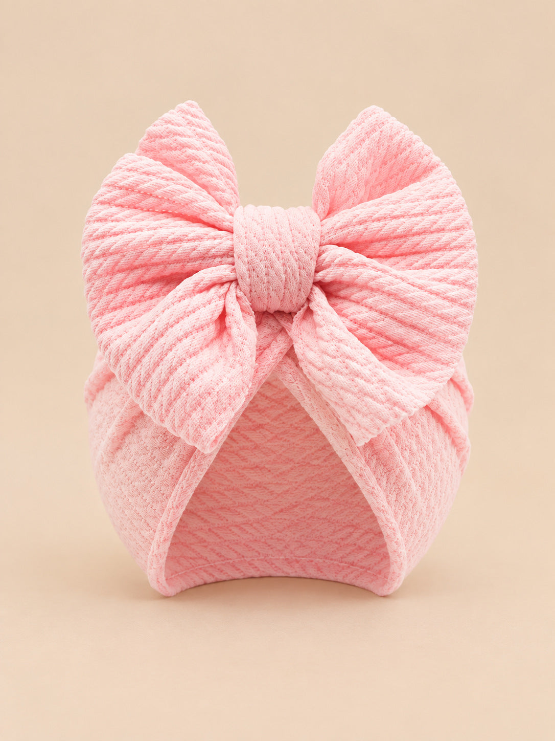 Baby-Turbanmütze für Mädchen mit Knoten im Mutter-Kind-Partnerlook – Farbvariante Rosa, Ansicht von vorn