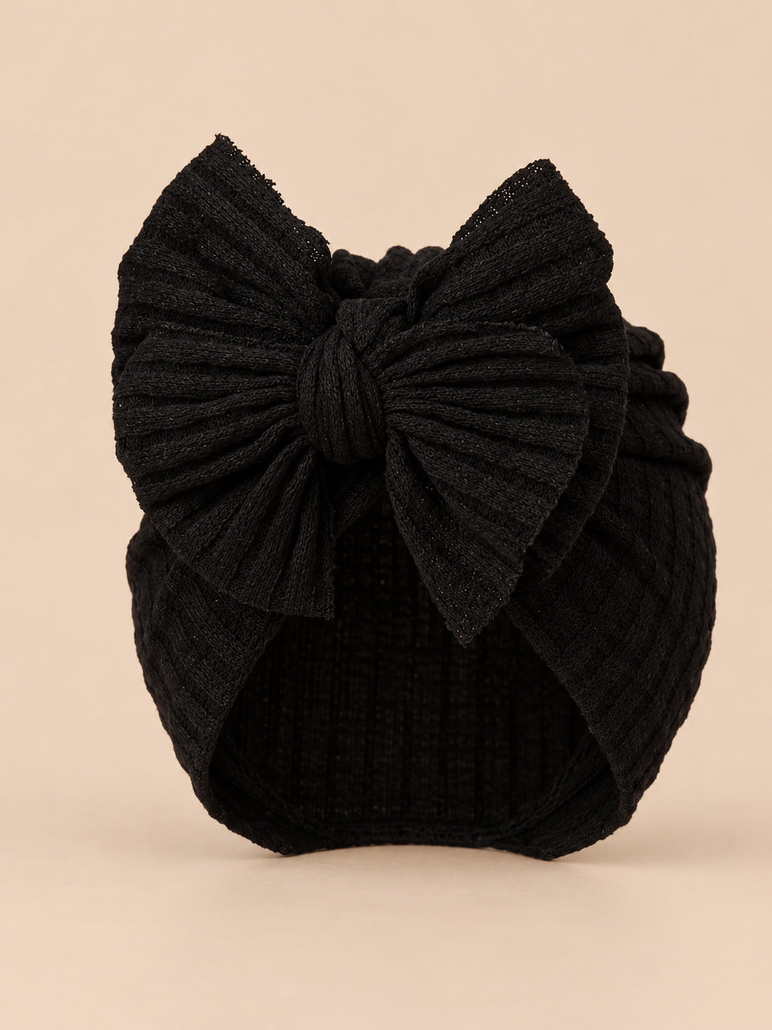 Baby-Turbanmütze für Mädchen aus Baumwollstrick mit Knoten – Farbvariante Schwarz, Ansicht von vorn