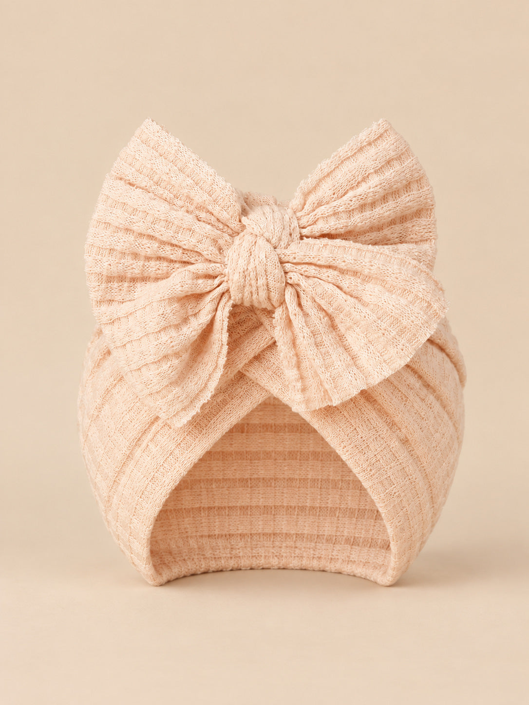 Baby-Turbanmütze für Mädchen aus Baumwollstrick mit Knoten – Farbvariante Rosa, Ansicht von vorn